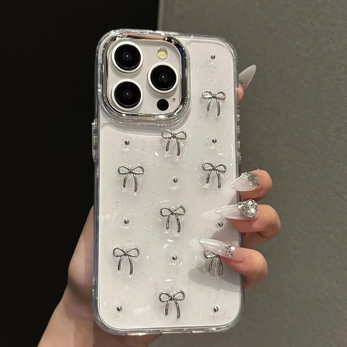 Cute silver bow glitter iPhone case with 3D silver bows and clear protective edges